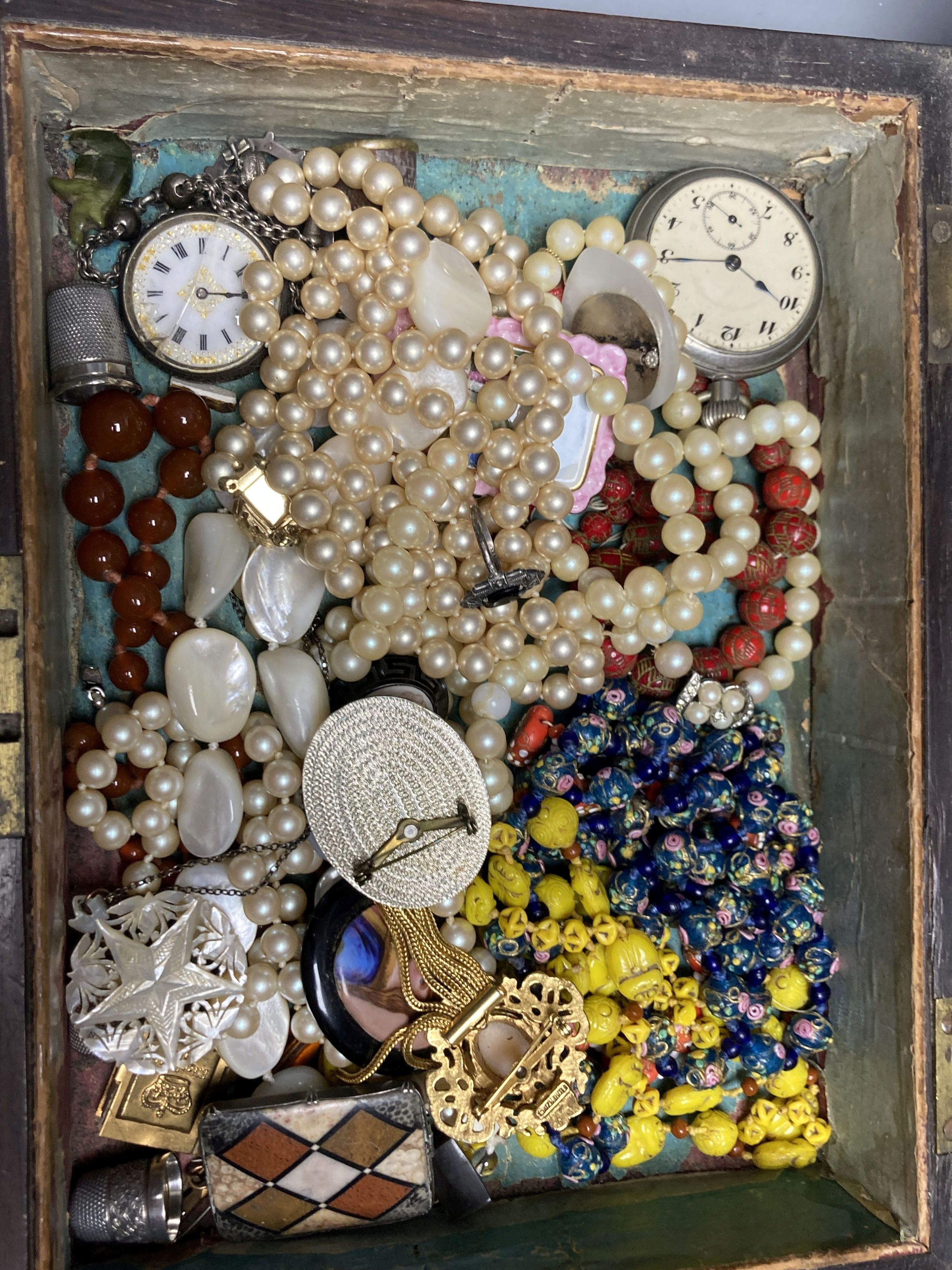 A silver travelling watch case, two pocket watch and assorted jewellery including knot stick pin, costume, necklaces etc.